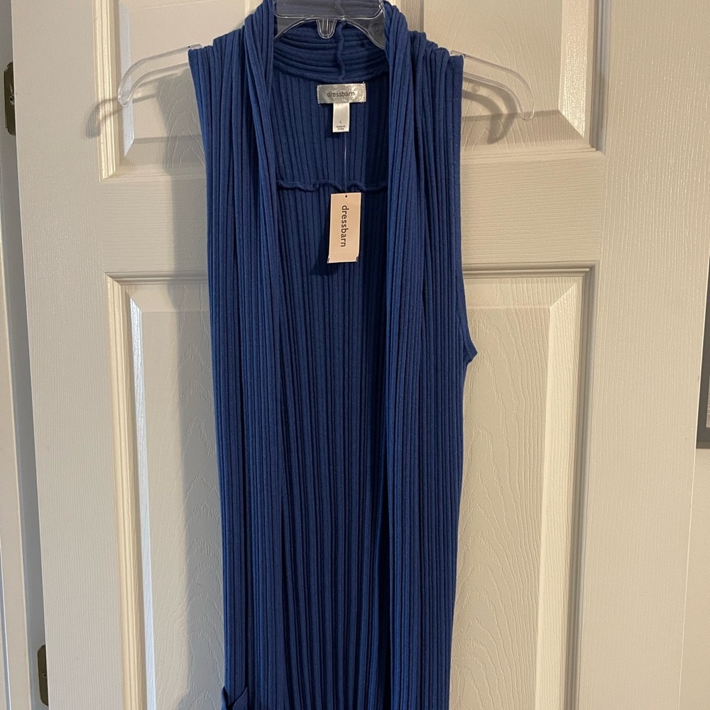 NWT long sleeveless light sweater vest. 60%, cotton, 20% nylon 20% viscose. L